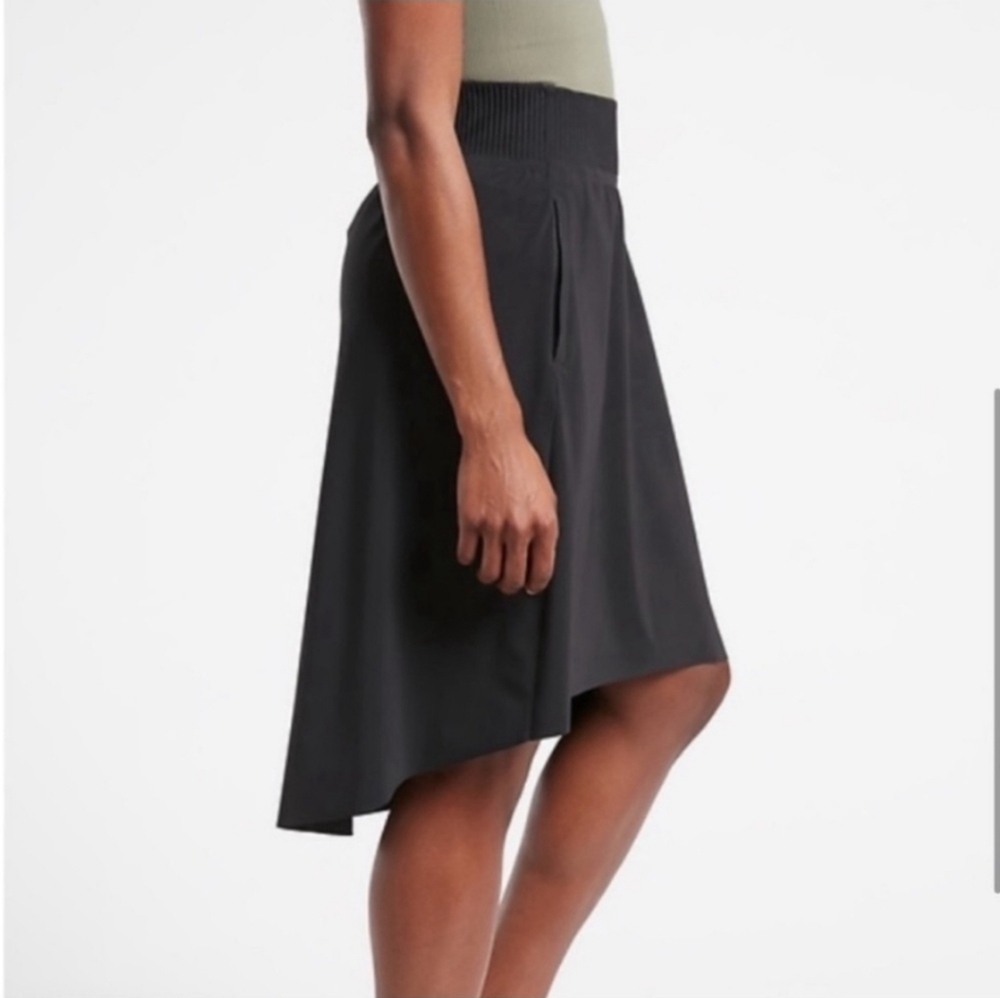 ATHLETA Cosmic Hi Lo Above Knee  Midi Skirt Pull On Zip Pockets Black Sz LARGE